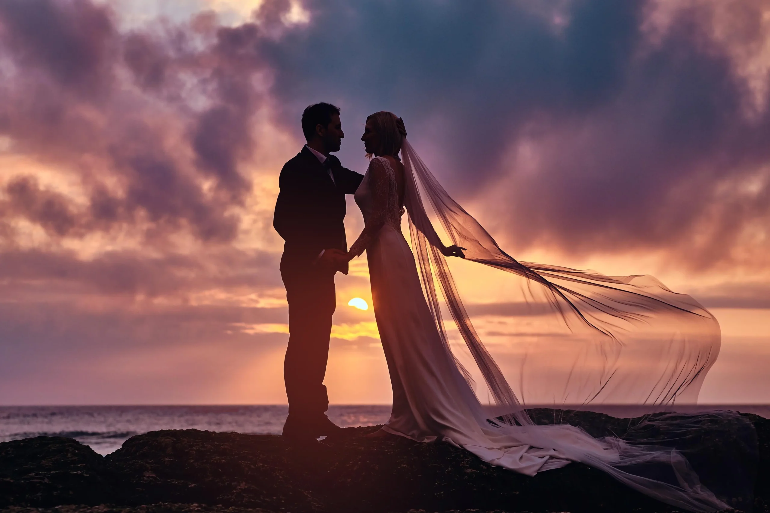 Beach wedding at sunset